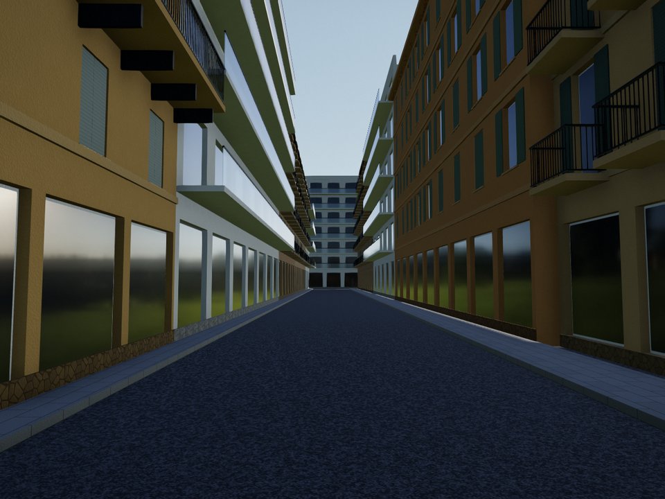 La rue voisine, ouverte par l'extension : trottoirs, façades des deux côtés, et au bout l'immeuble d'en face.
